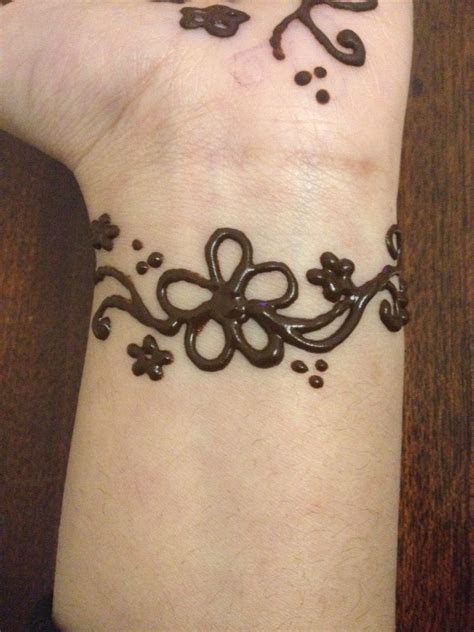 See more ideas about tattoos, henna, henna tattoo. Flower wrist henna | Wrist henna, Henna designs, Print tattoos
