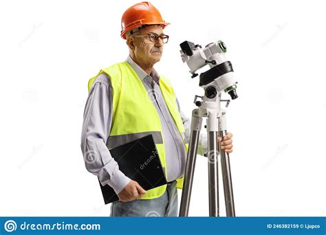 Geodetic Engineer Measuring With A Positioning Station Stock Image