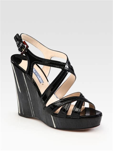 Prada Patent Leather And Wood Criss Cross Wedge Sandals In Black Lyst