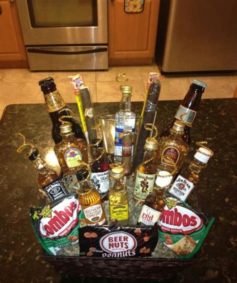 We've even got unique and diy ideas, in case you're looking for gifts for men who have everything. Manly basket | Liquor gifts, Homemade gift baskets ...