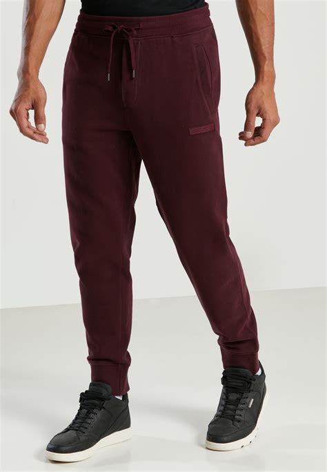 Buy American Eagle Burgundy Logo Cuffed Sweatpants For Men In Mena