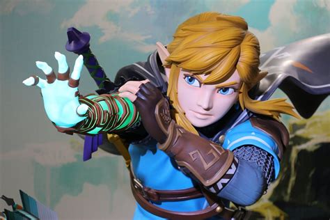 a gorgeous life size the legend of zelda tears of the kingdom statue is on display at nintendo