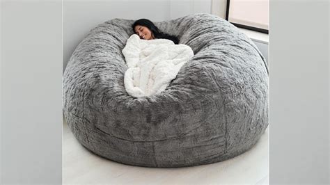 If you need us this fall, we'll be cuddled up in this huge pillow chair | Big comfy chair, Comfy ...