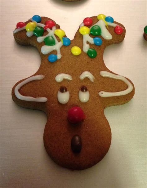 Kids will be amazed even if they just get to help place the nose!! Upside Down Reindeer Gingerbread Cookies / DIY Holiday Reindeer Cookies with Gingerbread Man ...