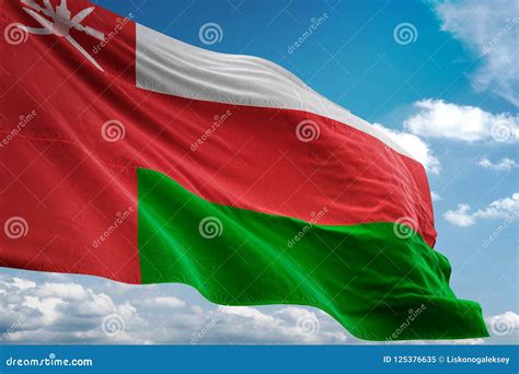 Oman National Flag Waving Blue Sky Background Realistic 3d Illustration