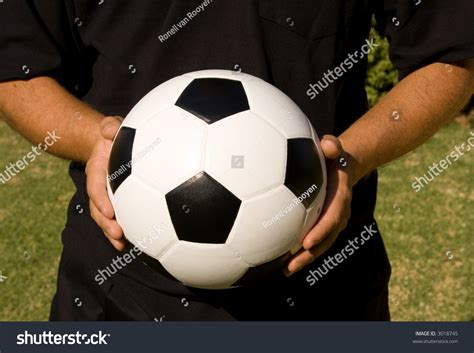 Two Hands Holding A Soccer Ball Stock Photo 3018745 Shutterstock