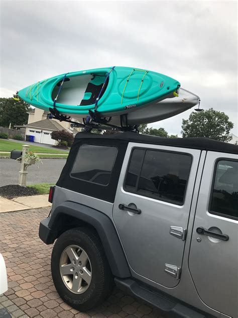 Jeep Wrangler With The Hitchmount Rack System Holding Two Kayaks Jeep