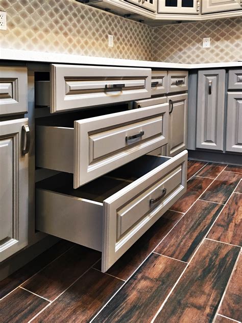 Can be opened on both sides. Anaheim Gray - Greencastle Cabinetry