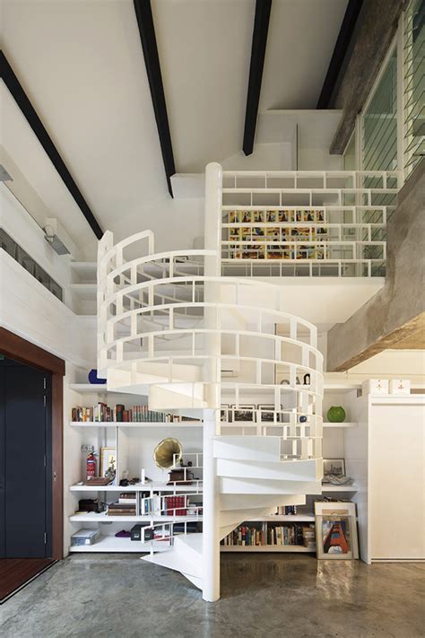 An industrial spiral staircase should be no exception to the old adage, measure twice, cut once, still in use after 400 years. Modern Industrial Loft in Singapore Gets Revitalizing Facelift