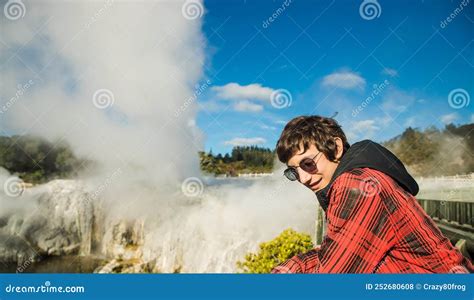 People In Geothermal Volcanic Park With Geysers And Hot Streams Scenic