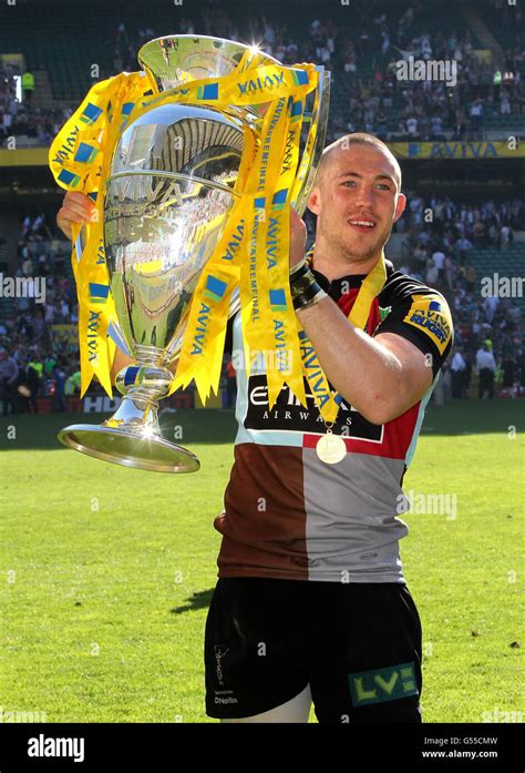 Harlequins Mike Brown Celebrates With The Trophy After Victory Over Leicester During The Aviva