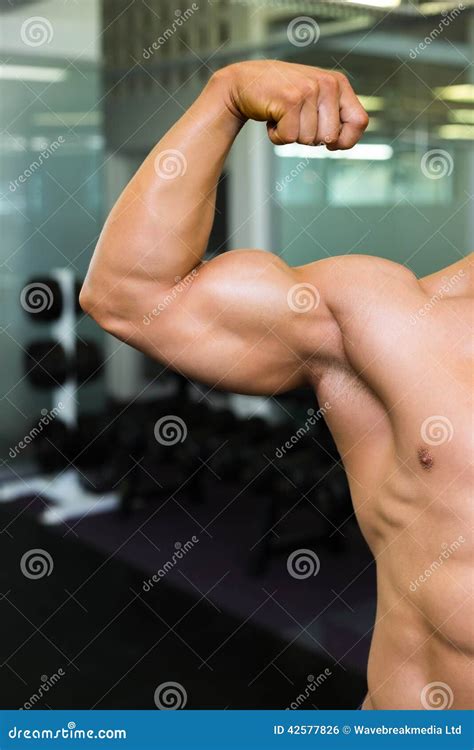 Close Up Of Muscular Man Flexing Muscles Stock Photo Image Of Front