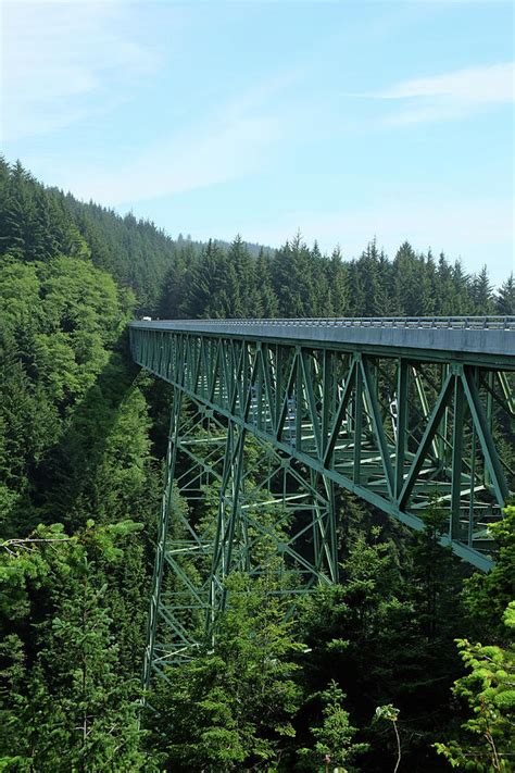 Oregon Coast Line With Trestle Train Bridge And Green Woods Photograph