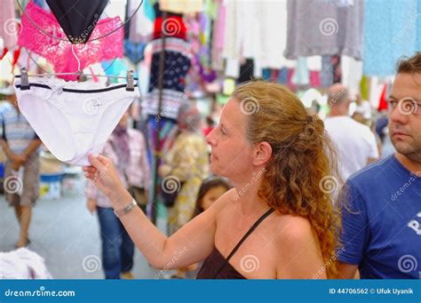 Woman Checking Underwear In Outdoor Market Editorial Photography Image Of Garment Business