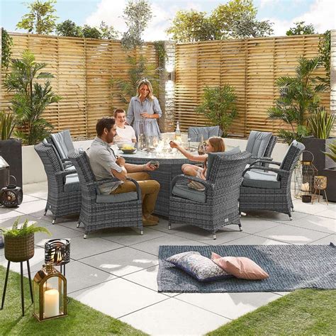 Olivia 8 Seat Round Dining Set With Fire Pit Grey