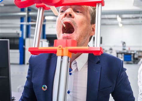 A dry cough would be suspect and difficulty breathing. Throat swabbing robot developed for COVID-19 testing by ...