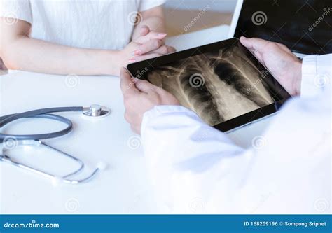 The Doctor Examined The Patient And Looked Stock Photo Image Of