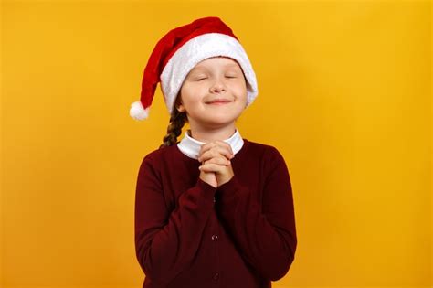 Premium Photo Little Girl Makes A Wish For Christmas