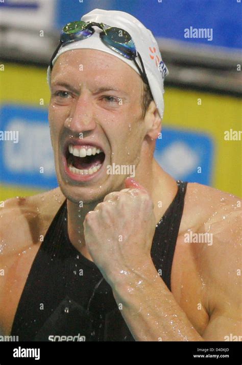 Alain Bernard Of France Celebrates Winning The Mens 100m Freestyle At