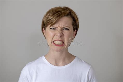 Human Expressions And Emotions Young Attractive Woman With An Angry Face Looking Furious And