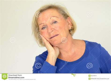 worried elderly lady looking at the camera stock image image of lady worried 55779111
