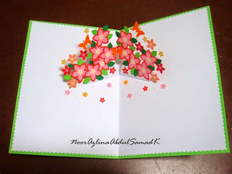 And you're going to do the same for the other side. AZLINA ABDUL: Double star loop flower pop up birthday card