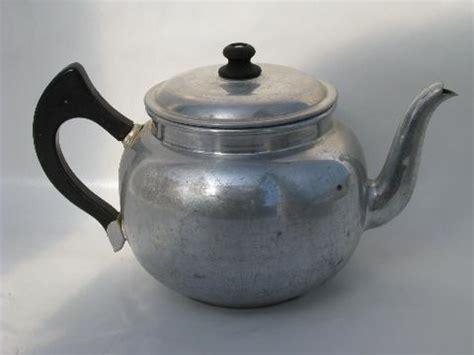 Different types and models of a stovetop percolator. Enterprise aluminum vintage dripolator coffee pot for stovetop