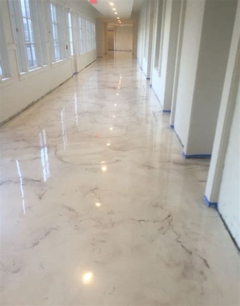Elegant pearly epoxy flooring is a practical idea for the public spaces of the house epoxy floors are usually installed over concrete ones, which gives them even more durability black epoxy floors installed in a garage because they are resistant to everything and aren't expensive 20 Epoxy Flooring Ideas With Pros And Cons - DigsDigs