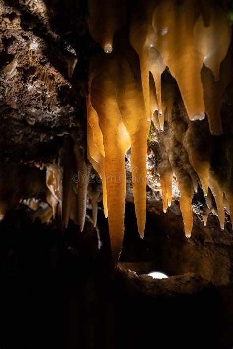 Exploring Underground Caves With Stalactite And Stalagmite Growth Stock