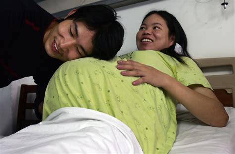 Deng Weijun Photos Photos Farmer Gives Birth To