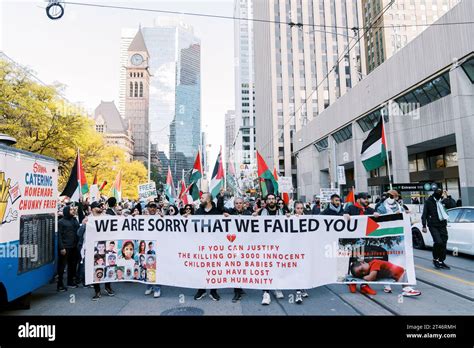 Toronto, Canada - 28 October 2023: Protesters in Toronto display