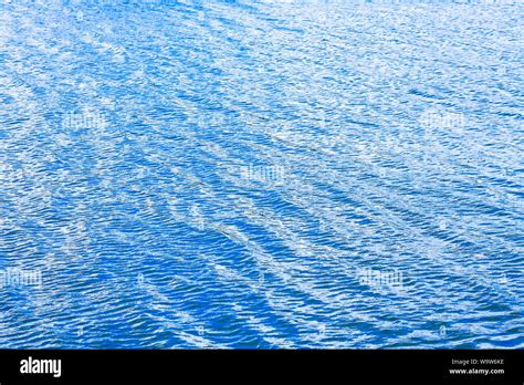 Blue And Clean Lake Water Surface Background Stock Photo Alamy