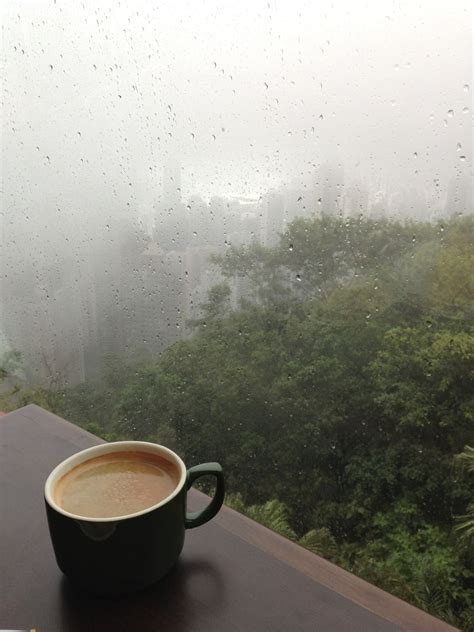 Having Coffee 550 Meters Up In The Sky Rainy Day Photography