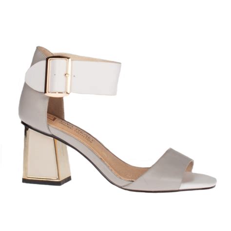 Una has developed and designer her own range of shoes, entitled 'una healy original collection' available nationwide and online. Una Healy Circle Song Evening Mix Beige Heeled Sandals ...