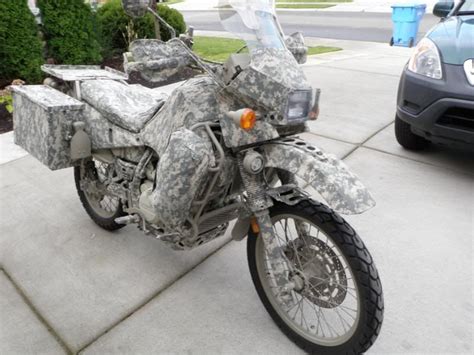 It's a good thing the manufacturers came up with this type of motorcycle to satisfy your need for adventure. Digital Desert camouflage the KLR650 step-by-step walk ...