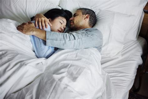 Couple Hugging On A Bed Stock Photo Image Of Bedroom 109177662