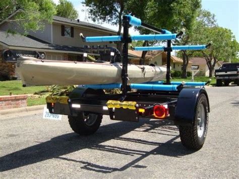 A Truck With A Kayak Attached To The Back