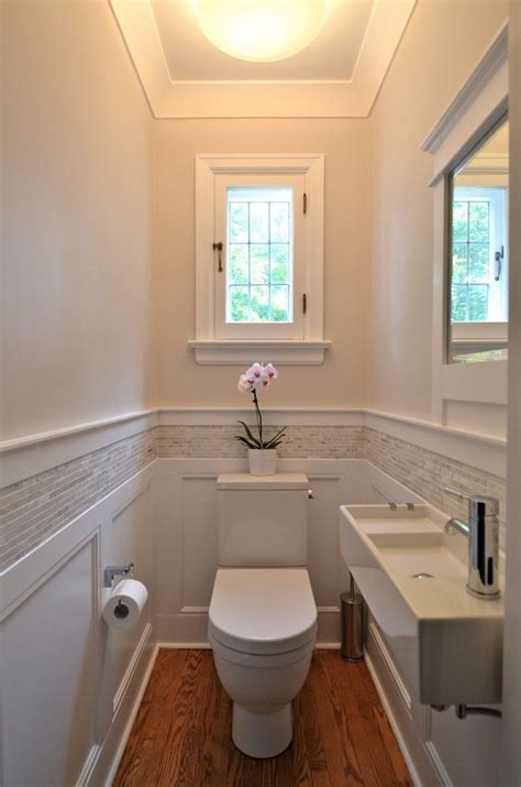 A powder room vanity with transitional cabinet styling like shaker style cabinet doors, mullion accents and tapered legs will work both in older homes and newer ones. Traditional Small Powder Room Ideas Best Rooms Beautiful ...