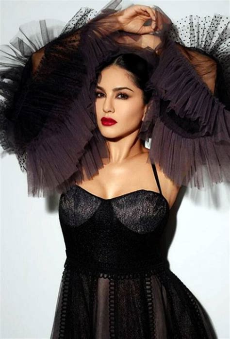Sunny Leone Looks Hot In A Sexy Black Gown With Ruffled Sleeves Her Deep Red Lips Are To Die For