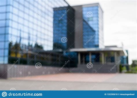 Abstract Background Of Blurred Building In The City As Business Concept