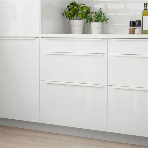 I have new ikea high gloss white abstrakt kitchen cabinets. IKEA - RINGHULT Drawer front high gloss white #kitchenshelves in 2020 | High gloss white, Drawer ...