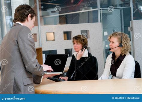 Front Desk Stock Photo Image Of Executive Businesspeople 9069130