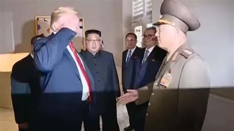 trump kim summit trump awkwardly saluting a north korean general is now kim regime propaganda
