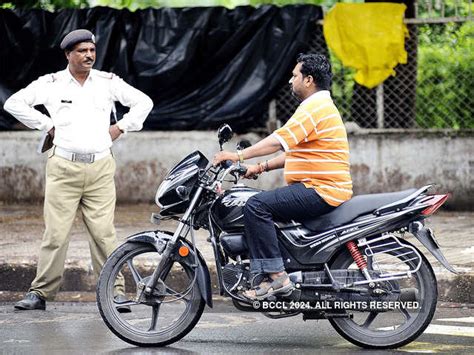 No Helmet Motor Vehicle Act Hike In Driving Penalties From