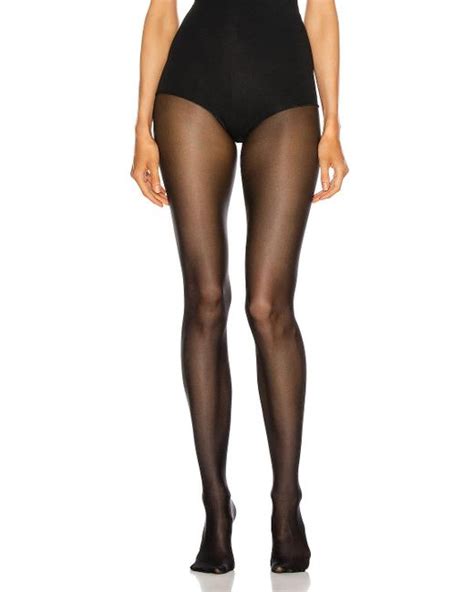 wolford synthetic neon 40 tights in black lyst