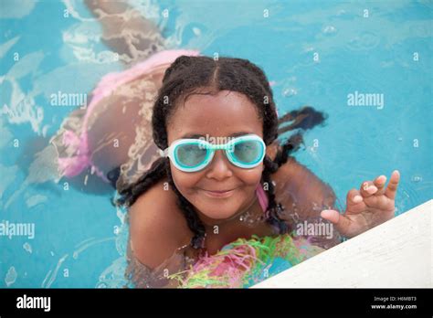 Funny Afroamerican Girl With Goggles Cooling Off In The Pool Stock