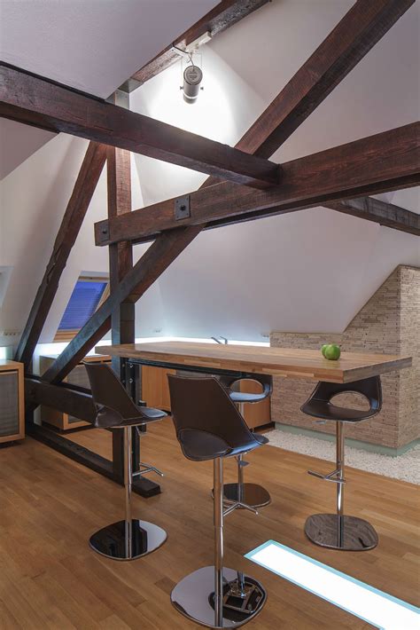 Wood Structure Defines Contemporary Renovated Attic Loft Apartment In