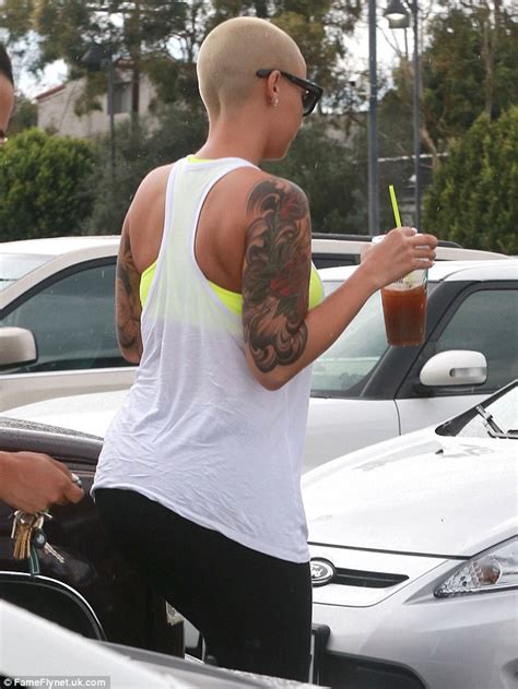 Amber Rose Shows Off Her Enviable Curves In Neon Workout Gear Daily