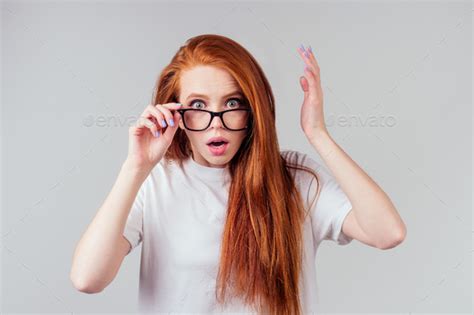 Redhaired Ginger Woman Wear Glasses In White Studio Stock Photo By