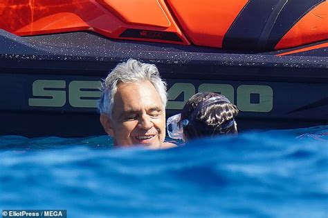 Andrea Bocelli 61 Enjoys A Dip In The Ocean With Bikini Clad Wife Veronica Berti 36 In St